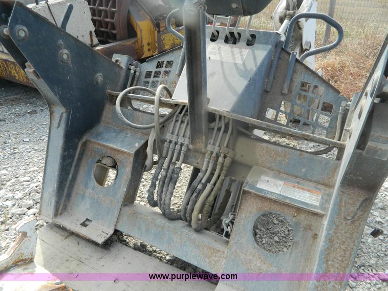 image for item BT9895 Bobcat 607 backhoe skid steer attachment