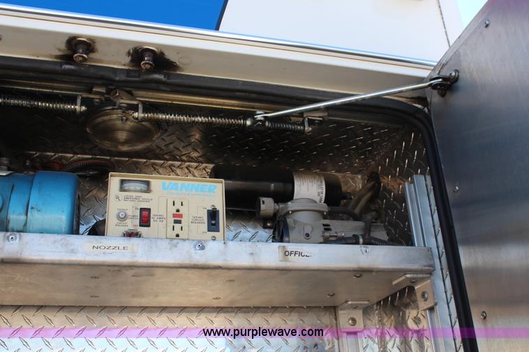 image for item I5884 2000 Freightliner FL60 ambulance