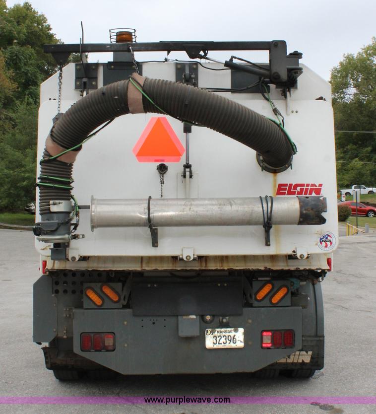 image for item J3711 2006 Sterling truck with Elgin Whirlwind MV vacuum air sweeper