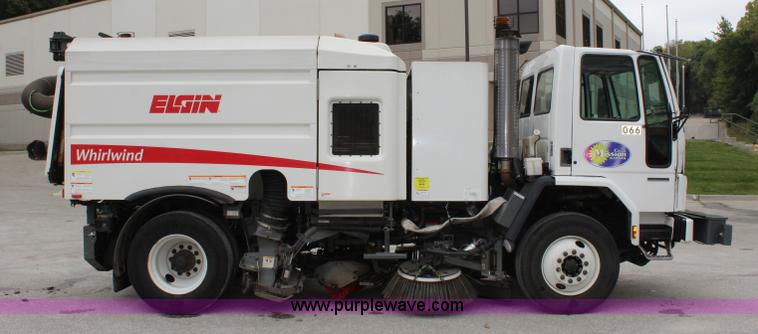 image for item J3711 2006 Sterling truck with Elgin Whirlwind MV vacuum air sweeper