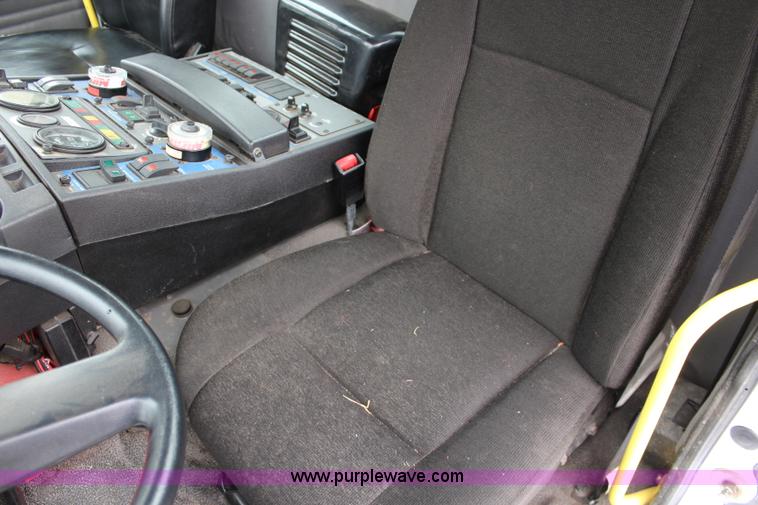 image for item J3711 2006 Sterling truck with Elgin Whirlwind MV vacuum air sweeper