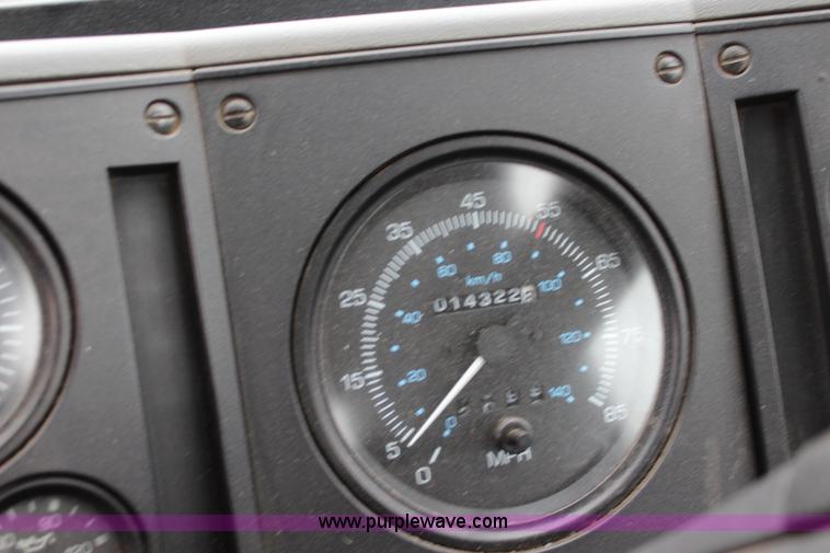 image for item J3711 2006 Sterling truck with Elgin Whirlwind MV vacuum air sweeper