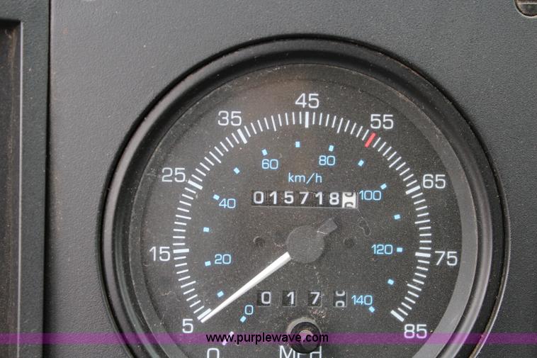 image for item J3711 2006 Sterling truck with Elgin Whirlwind MV vacuum air sweeper