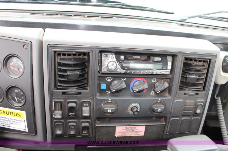 image for item J3711 2006 Sterling truck with Elgin Whirlwind MV vacuum air sweeper