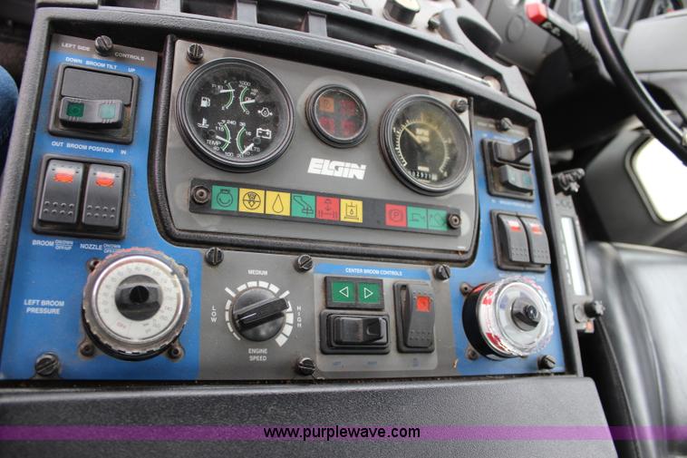 image for item J3711 2006 Sterling truck with Elgin Whirlwind MV vacuum air sweeper