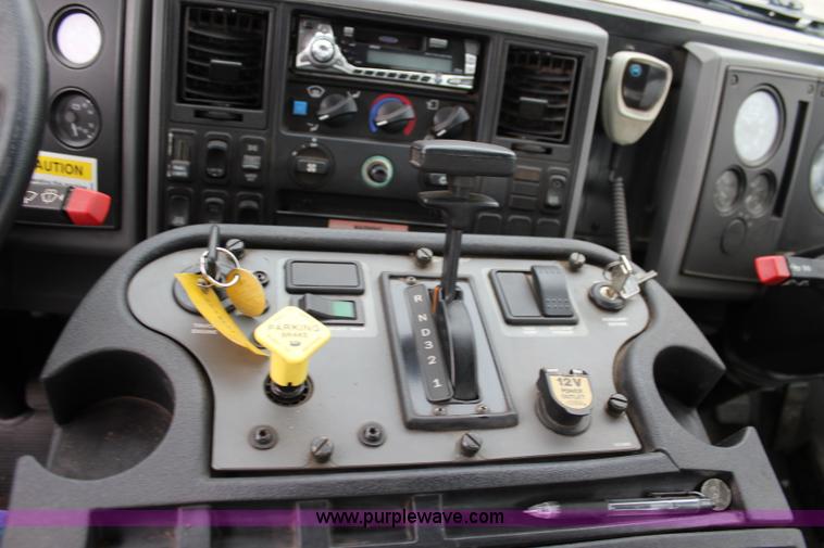 image for item J3711 2006 Sterling truck with Elgin Whirlwind MV vacuum air sweeper