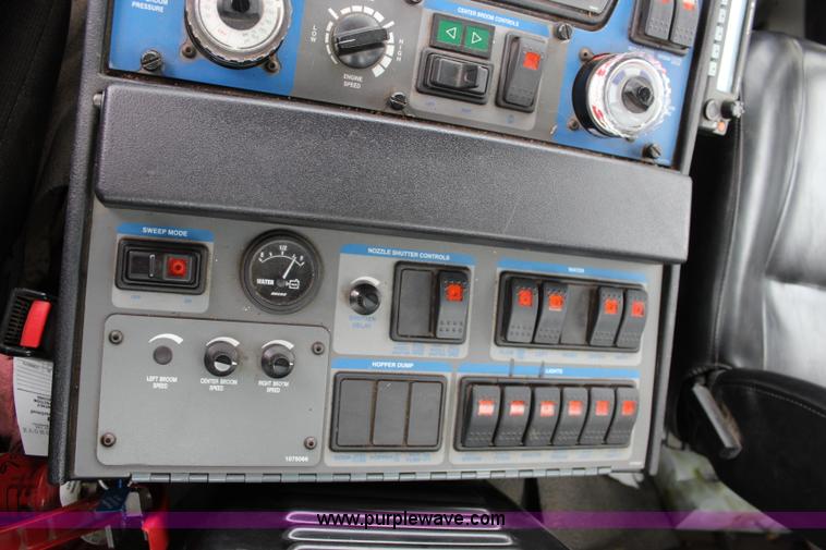 image for item J3711 2006 Sterling truck with Elgin Whirlwind MV vacuum air sweeper