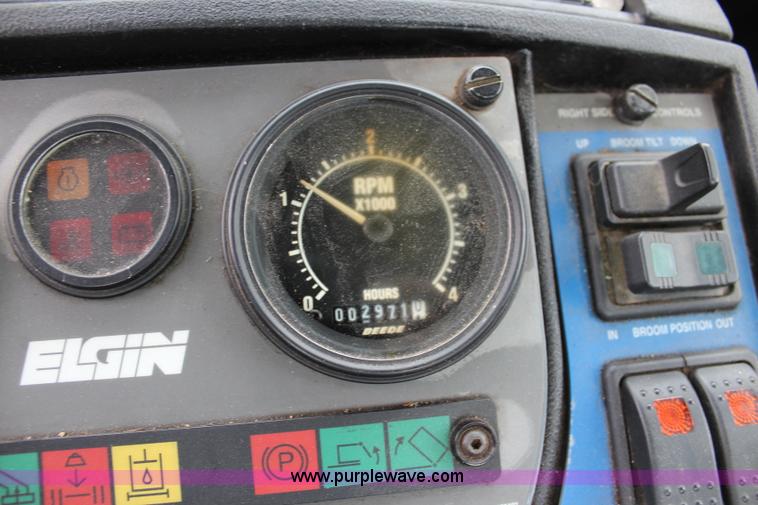 image for item J3711 2006 Sterling truck with Elgin Whirlwind MV vacuum air sweeper