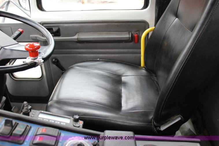 image for item J3711 2006 Sterling truck with Elgin Whirlwind MV vacuum air sweeper