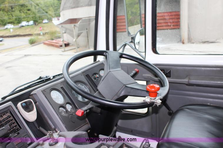 image for item J3711 2006 Sterling truck with Elgin Whirlwind MV vacuum air sweeper