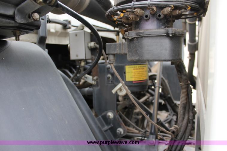 image for item J3711 2006 Sterling truck with Elgin Whirlwind MV vacuum air sweeper