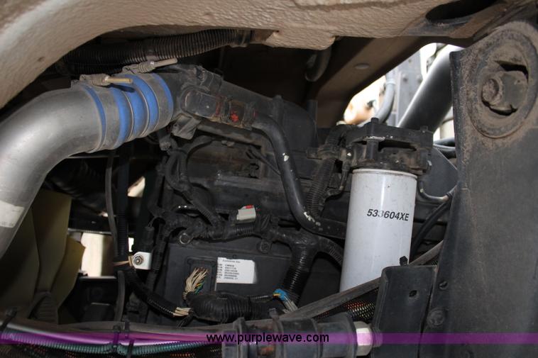 image for item J3711 2006 Sterling truck with Elgin Whirlwind MV vacuum air sweeper