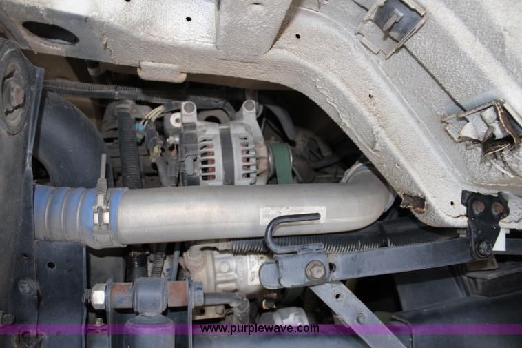 image for item J3711 2006 Sterling truck with Elgin Whirlwind MV vacuum air sweeper