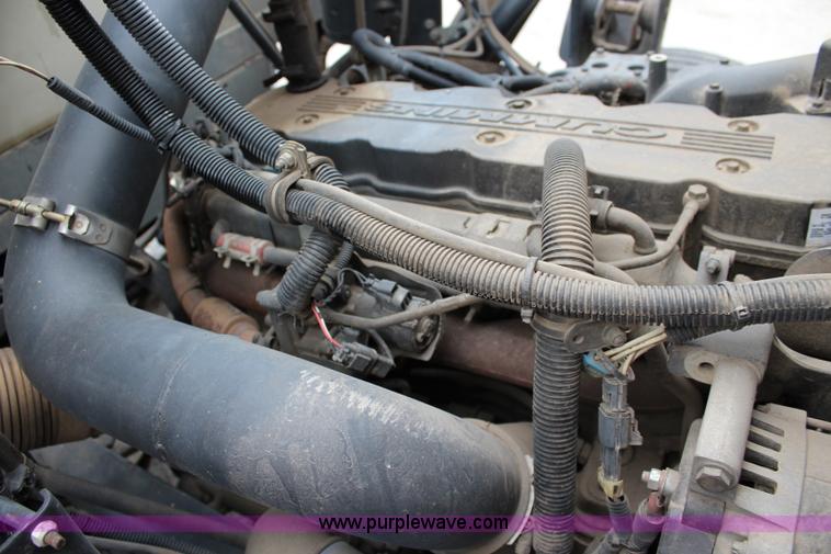 image for item J3711 2006 Sterling truck with Elgin Whirlwind MV vacuum air sweeper