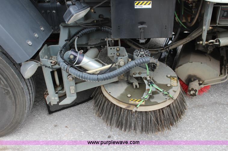 image for item J3711 2006 Sterling truck with Elgin Whirlwind MV vacuum air sweeper