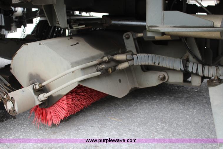 image for item J3711 2006 Sterling truck with Elgin Whirlwind MV vacuum air sweeper