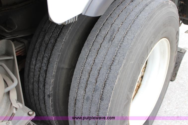 image for item J3711 2006 Sterling truck with Elgin Whirlwind MV vacuum air sweeper