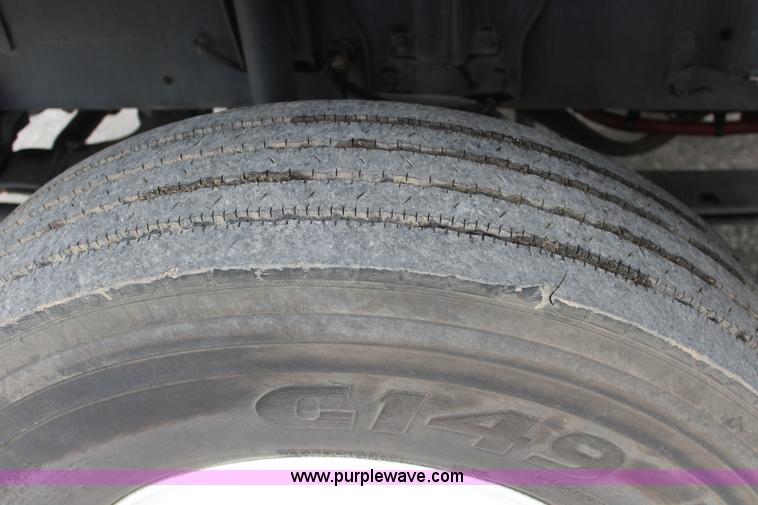 image for item J3711 2006 Sterling truck with Elgin Whirlwind MV vacuum air sweeper