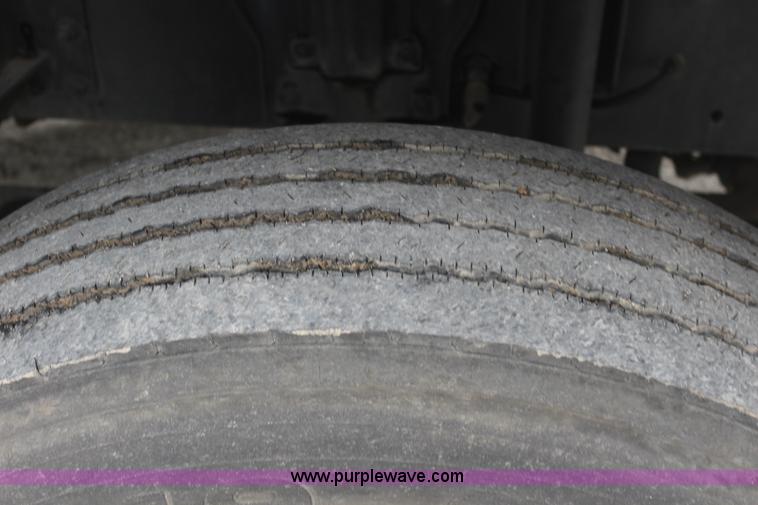 image for item J3711 2006 Sterling truck with Elgin Whirlwind MV vacuum air sweeper