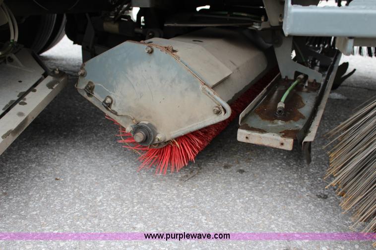 image for item J3711 2006 Sterling truck with Elgin Whirlwind MV vacuum air sweeper