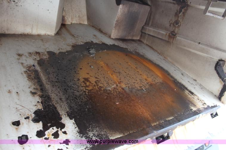 image for item J3711 2006 Sterling truck with Elgin Whirlwind MV vacuum air sweeper