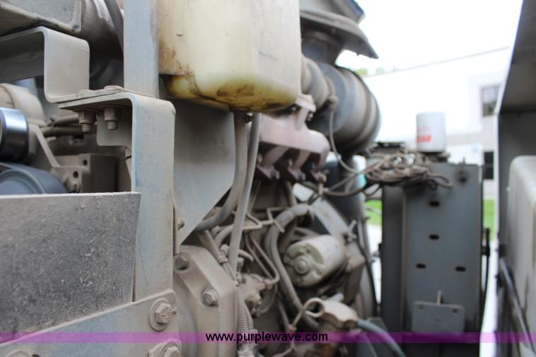 image for item J3711 2006 Sterling truck with Elgin Whirlwind MV vacuum air sweeper