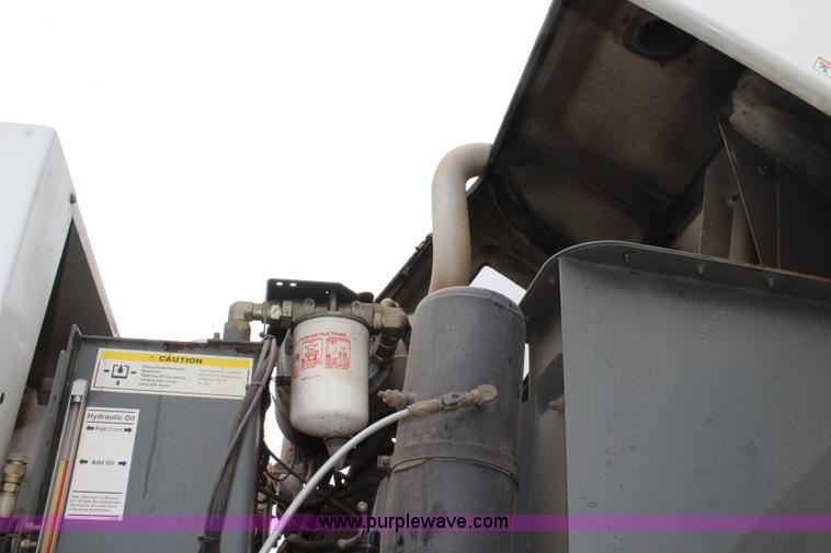 image for item J3711 2006 Sterling truck with Elgin Whirlwind MV vacuum air sweeper