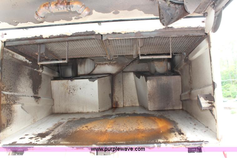 image for item J3711 2006 Sterling truck with Elgin Whirlwind MV vacuum air sweeper