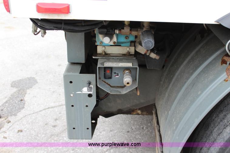 image for item J3711 2006 Sterling truck with Elgin Whirlwind MV vacuum air sweeper