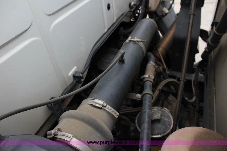 image for item J3711 2006 Sterling truck with Elgin Whirlwind MV vacuum air sweeper