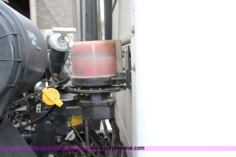 image for item J3711 2006 Sterling truck with Elgin Whirlwind MV vacuum air sweeper