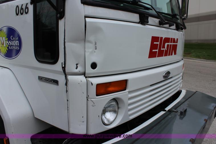 image for item J3711 2006 Sterling truck with Elgin Whirlwind MV vacuum air sweeper