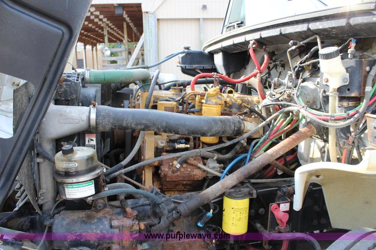 image for item J3716 2003 Freightliner FL80 dump truck