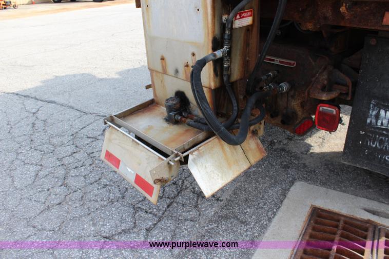 image for item J3716 2003 Freightliner FL80 dump truck