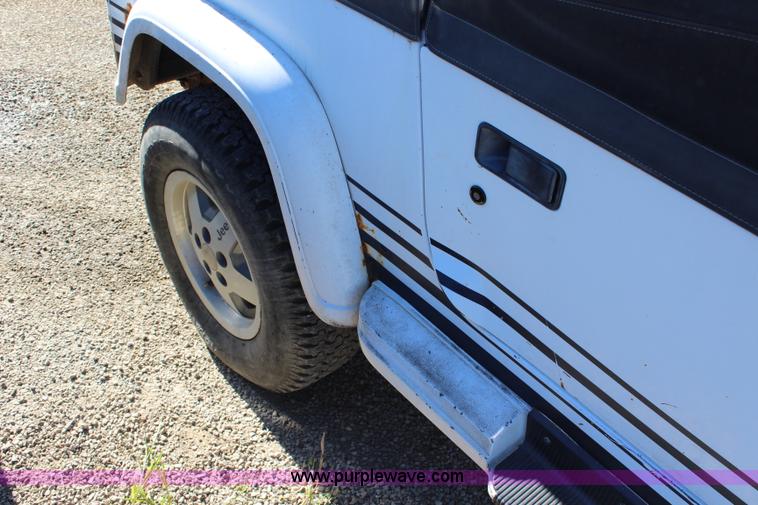 image for item L2447 1992 Jeep Wrangler Islander SUV