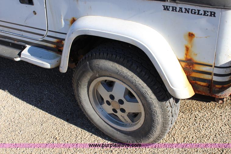 image for item L2447 1992 Jeep Wrangler Islander SUV