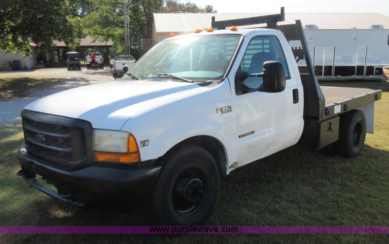 image for item I1940 1999 Ford F350 Super Duty flatbed pickup truck