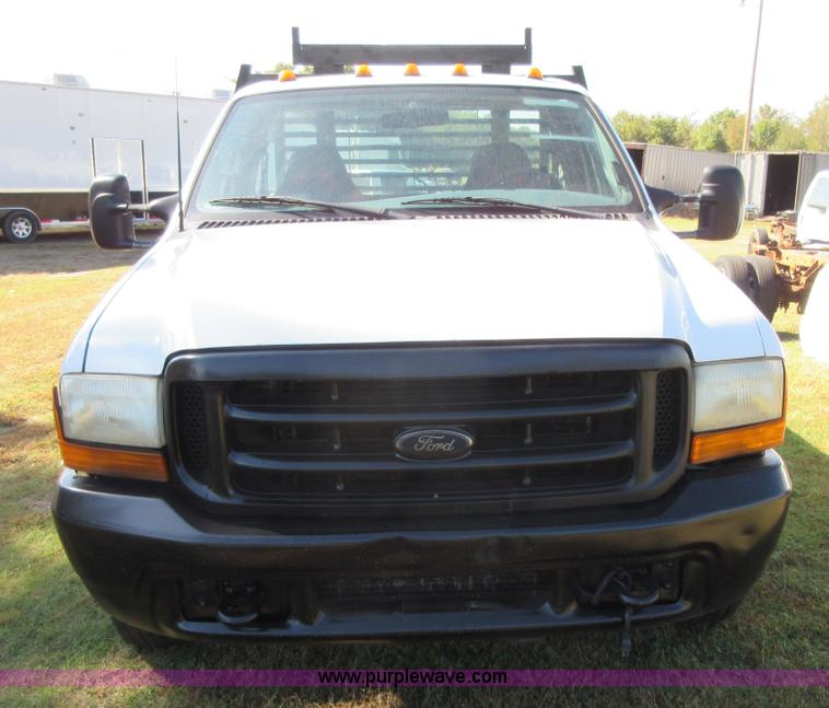 image for item I1940 1999 Ford F350 Super Duty flatbed pickup truck