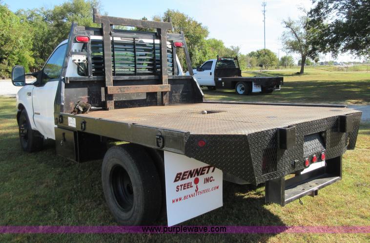 image for item I1940 1999 Ford F350 Super Duty flatbed pickup truck