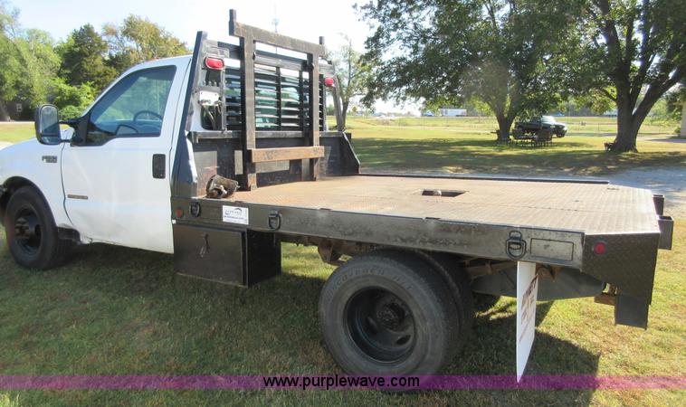 image for item I1940 1999 Ford F350 Super Duty flatbed pickup truck