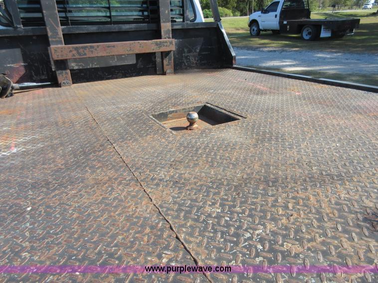 image for item I1940 1999 Ford F350 Super Duty flatbed pickup truck