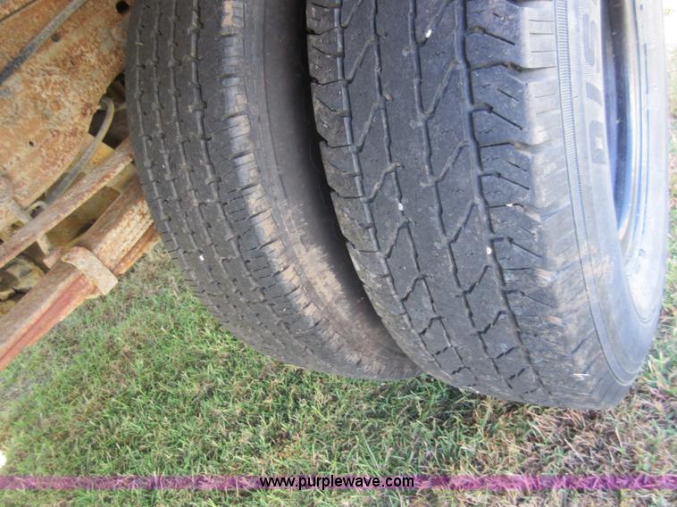 image for item I1940 1999 Ford F350 Super Duty flatbed pickup truck