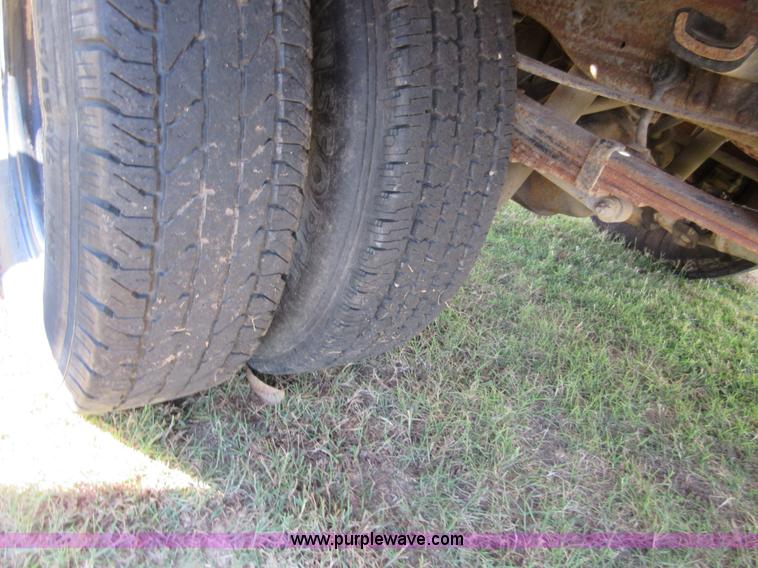 image for item I1940 1999 Ford F350 Super Duty flatbed pickup truck