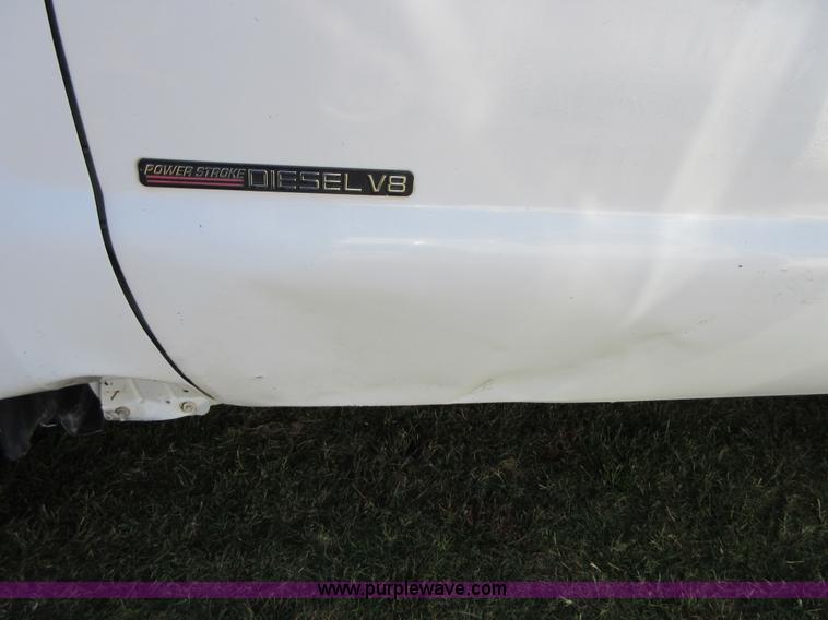 image for item I1940 1999 Ford F350 Super Duty flatbed pickup truck