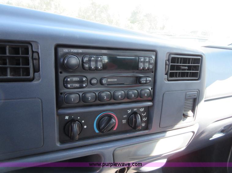 image for item I1940 1999 Ford F350 Super Duty flatbed pickup truck