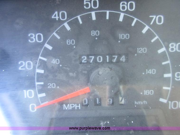 image for item I1940 1999 Ford F350 Super Duty flatbed pickup truck