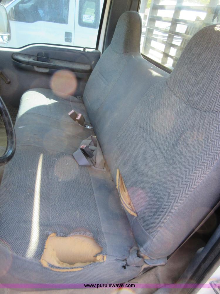 image for item I1944 2001 Ford F350 Super Duty flatbed pickup truck