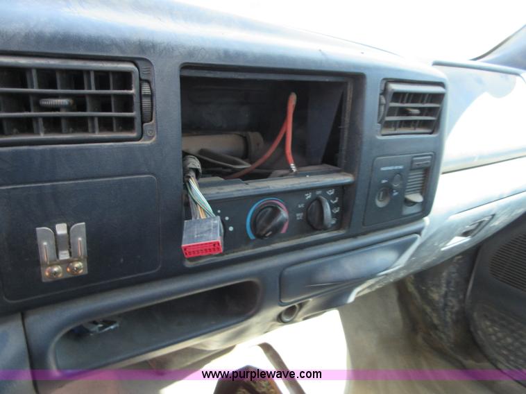 image for item I1944 2001 Ford F350 Super Duty flatbed pickup truck