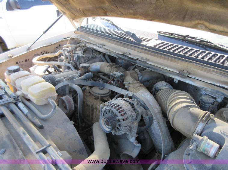 image for item I1944 2001 Ford F350 Super Duty flatbed pickup truck