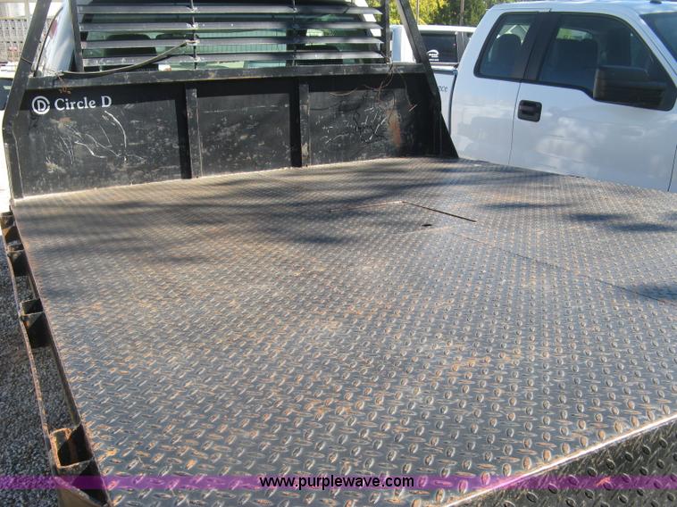 image for item J7879 2004 Chevrolet Silverado 2500HD flatbed pickup truck